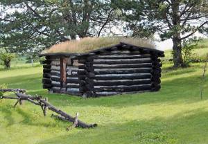 Old log cabin on display at Mt. Pisgah. Photo by Kenneth Mays.