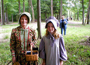 Barbara Whidden, as Eliza R. Snow, and Amanda Wright, in History Center's Living Village where Kirtland visitors can experience life in early days of Church. Photo by Cheryl McClellan, LCHS staff