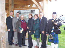 Left to Right: George Pattison, President of the Saint-John New Brunswick Stake of The Church of Jesus Christ of Latter-day Saints, Kim Wilson, Chair of the Mormon Historic Sites Foundation, Gilles Laplante President of Friends Of Beaubears Island, Joyce LeBlanc, Research and designer, Carole Loiselle, Field Unit Superintendent Parks Canada, Fred Woods, executive director of the Mormon Historic Sites Foundation, and Rob Galliah, piper. Photo courtesy Joyce LeBlanc