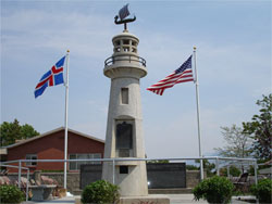 The Icelandic Memorial (shown behind) was dedicated on June 25, 2005. A similar monument was constructed in Iceland on the Westmann Island in 2000. Photo Courtesy Derek J. Tangren