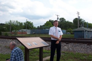 Douglas Atterberg, a local historian, recounts part of the history of Fort Des Moines where the Foundation created this historical marker. Photo courtesy Fred E. Woods