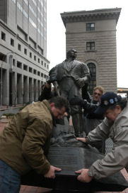 Joseph Smith statue is put in place by Utahns [Matt Kennedy and Steve Glenn] who came to New York for the installation. Photo by Carl Glassman