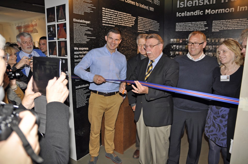 Kim Wilson, Chairman of the Board of the Mormon Historic Sites Foundation cutting the ribbon for the July 2013 dedication.