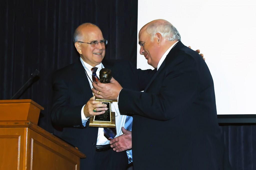 Robert Scott Lorimer receiving the Junius Wells Award from Richard Lambert