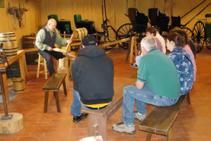 Missionary demonstration, Family Living Center, Nauvoo. Photo by Kenneth Mays.