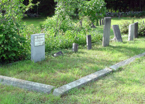 The larger headstone at the left marks the burial site of Solomon Mack, father of Lucy Mack Smith. Photo by Kenneth Mays.